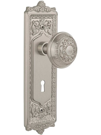 Egg and Dart Door Set with Matching Knobs and Keyhole Single Dummy in Satin Nickel.